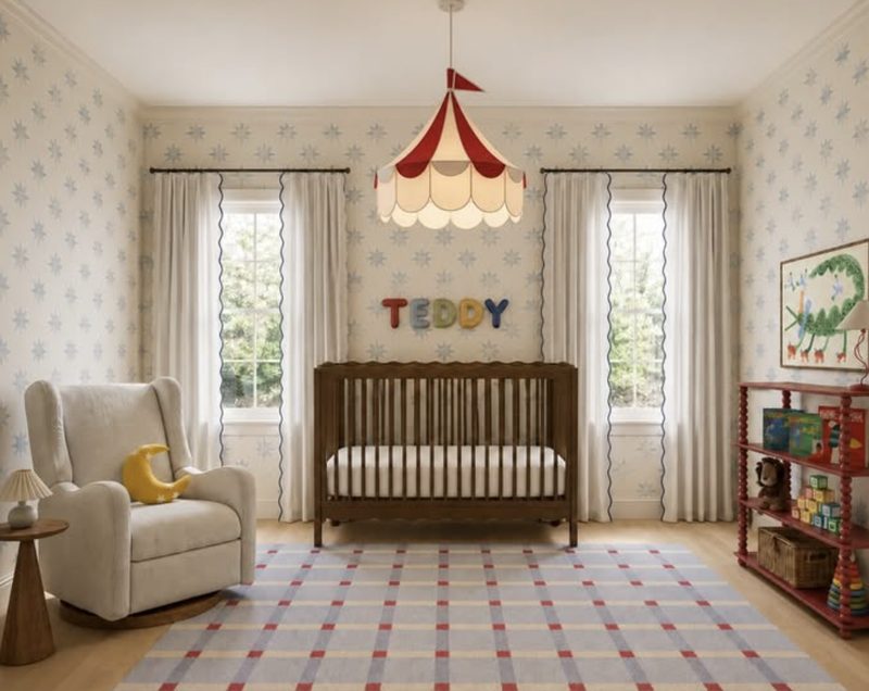 Nursery with star wallpaper, a circus-tent pendant light, a walnut crib and TEDDY letters on the wall
